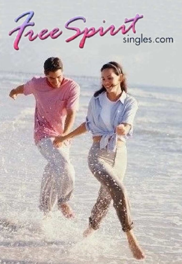Couple running together on the beach with water splashing, 'Free Spirit' singles logo at top.